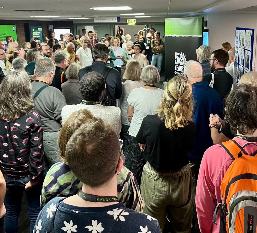  Crowd listening to Carla Denyer speaking about 50th anniversary of the Green Party in Brighton 2023