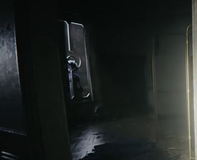 A screenshot from the linked video. Standing ominously through a window in the background is (presumably) the Hex Maniac trainer model.