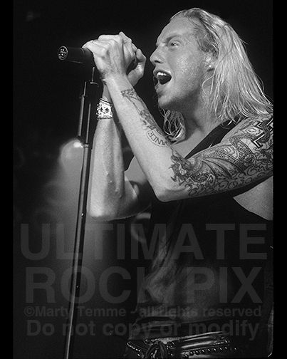Jani Lane of Warrant in concert in 1992 by Marty Temme.