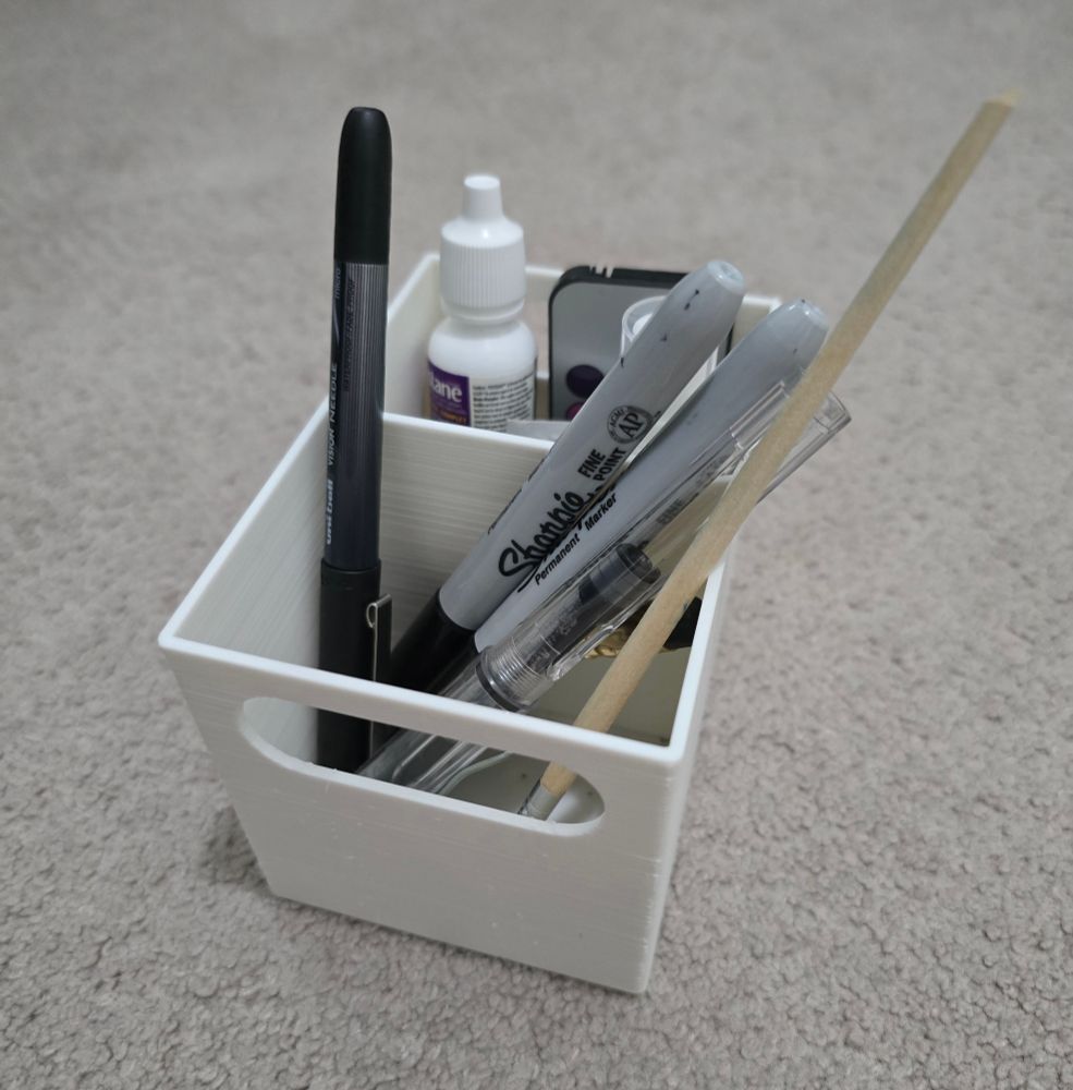 A screenshot of a 3D model of a desk organizer made in FreeCAD. Its design includes carrying handles.
