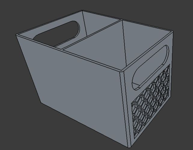 A screenshot of a 3D model of a desk organizer made in FreeCAD. It has a hexagon mesh design and carrying handles. This one is properly fused, filleted, and chamfered.