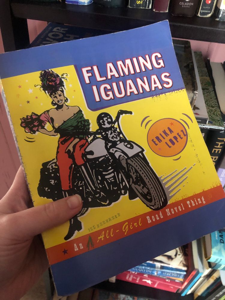 Book titled Flaming Iguanas by Erika Lopez subtitle: An All-Girl Road Novel Thing 