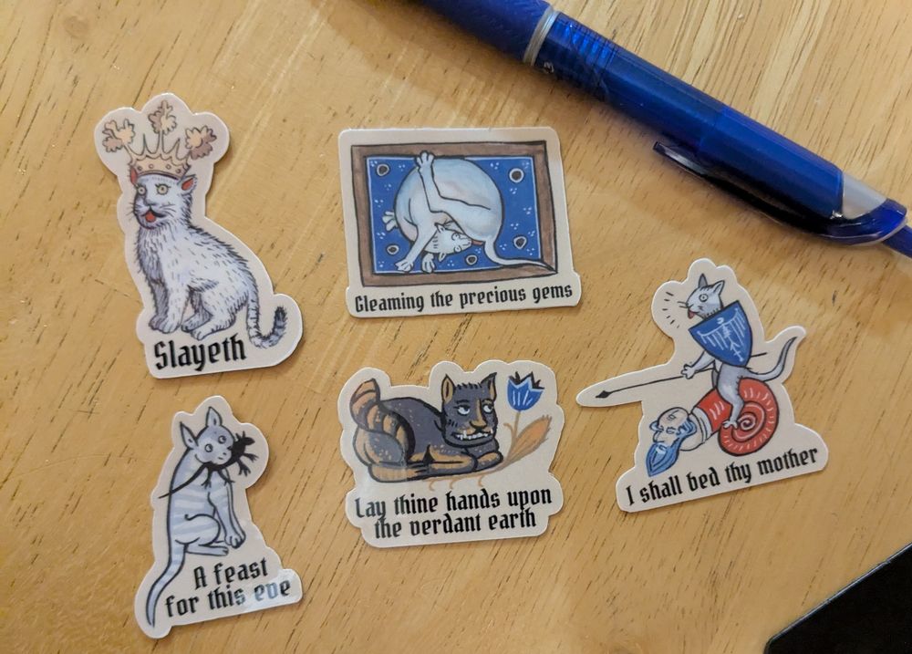 Collection of stickers of ugly medieval cat art