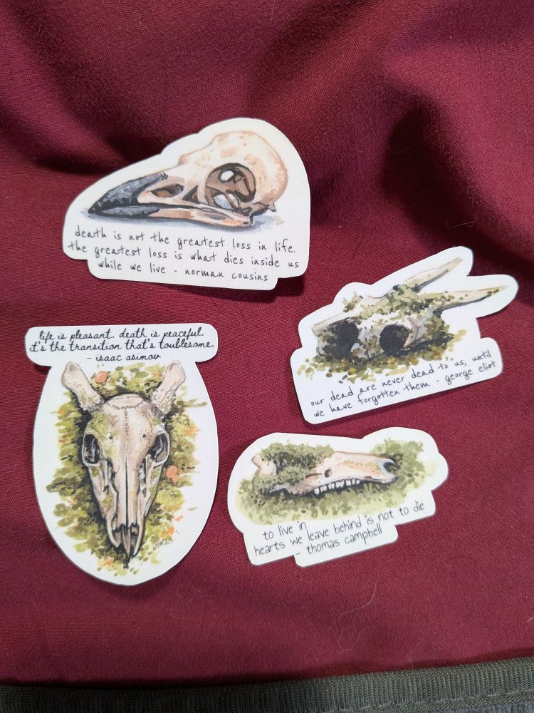 4 stickers featuring animal skulls with melancholy quotes