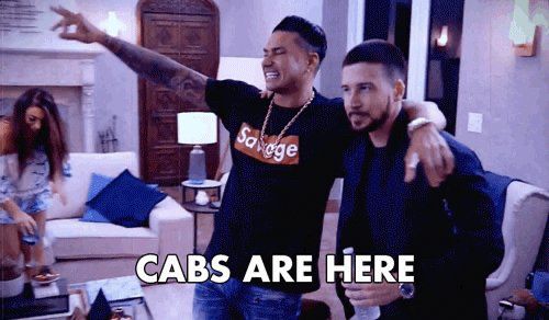 CABS ARE HERE in white block text over Pauly D with his arm up hugging Vinnie. Screen shot from Jersey Shore