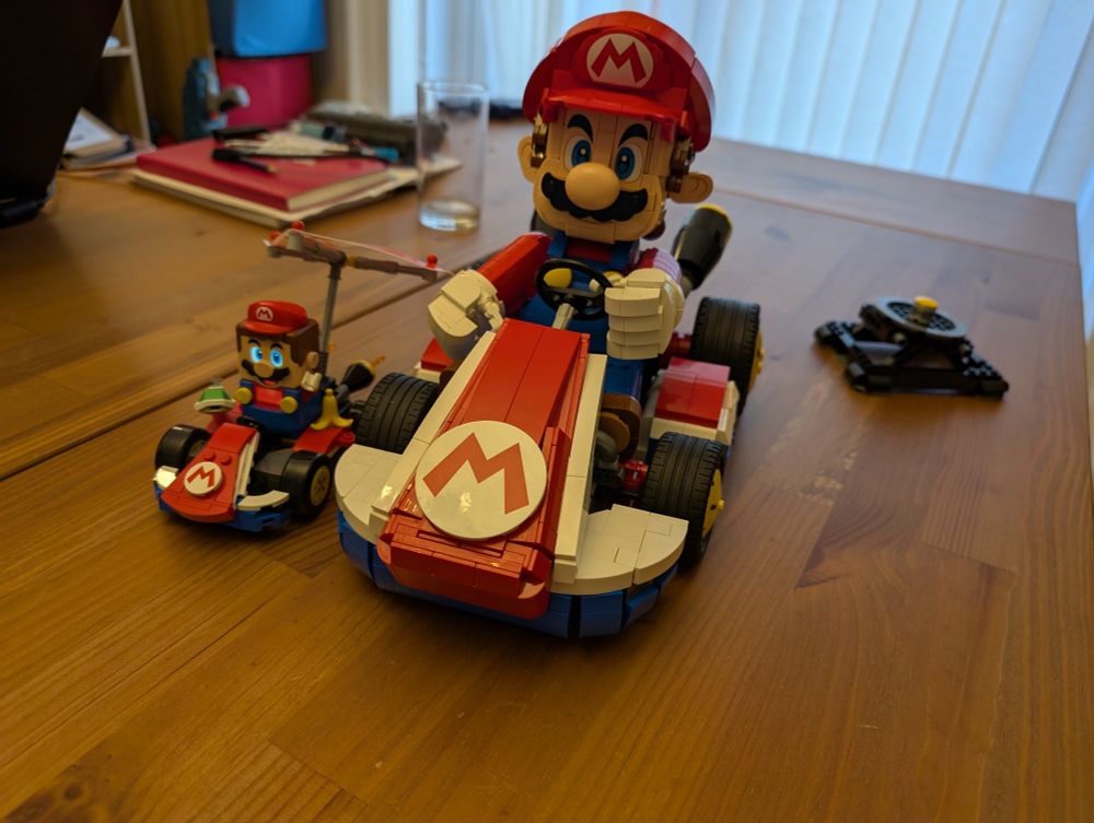 Large mario kart next to the small one
