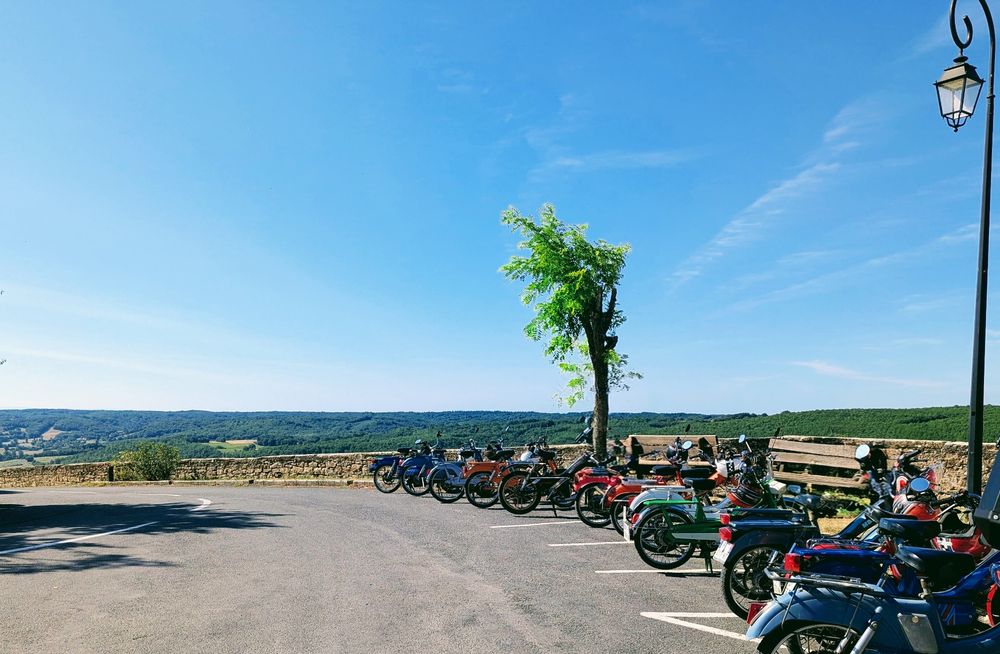 A bunch of colorful #motorcycle with a beautiful landscape in the background
