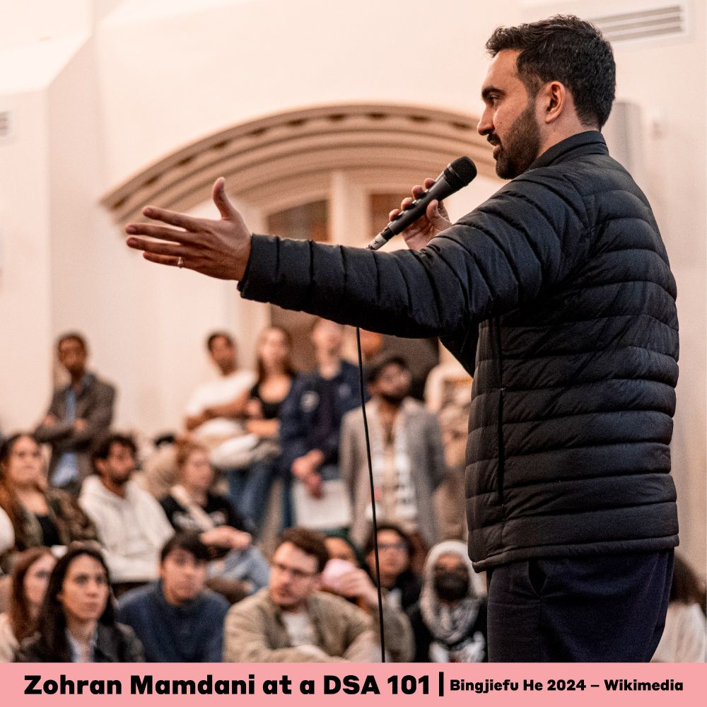 This is a photo of Zohran Mamdani speaking at a DSA 101 in New York City in 2024. This photo was taken by Bingjiefu He and was sourced from Wikimedia.