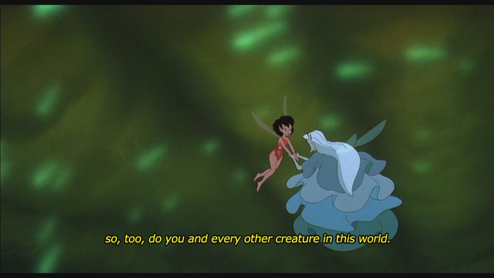 Screenshot from the 1992 animated film Ferngully: The Last Rainforest. The camera pans out again, showing the two fairies in conversation surrounded by glowing green lights that fly by. The aged fairy continues from the last screenshot: "...so, too, do you and every other creature in this world."