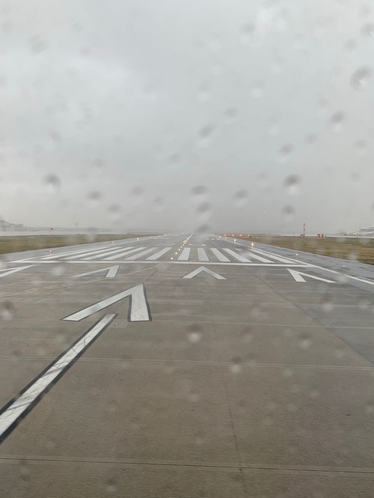 Airport runway in the rain