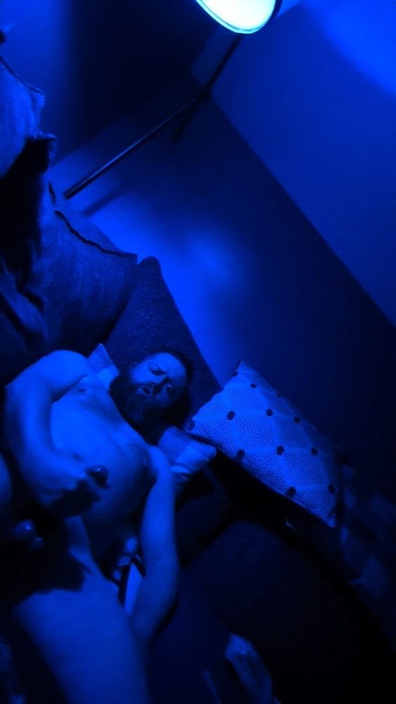 Stroking with a ball stretcher under blue light