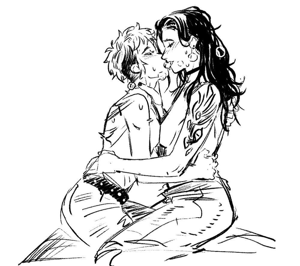 A quick ink of two topless women making out passionately with their boobs pressed against each other 