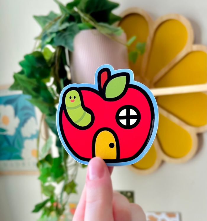 worm in an apple house sticker. 