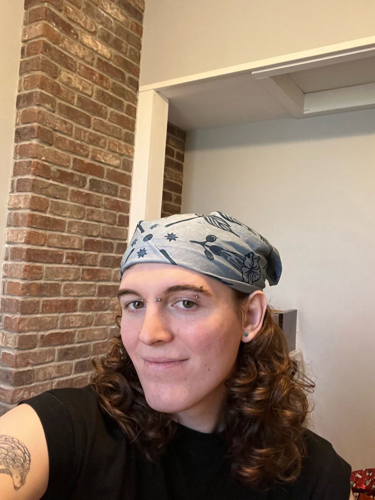 another selfie of me, but this time my hair is back in a bandana