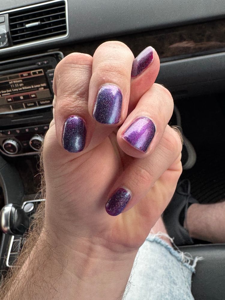 Me showing off my painted nails incorrectly 