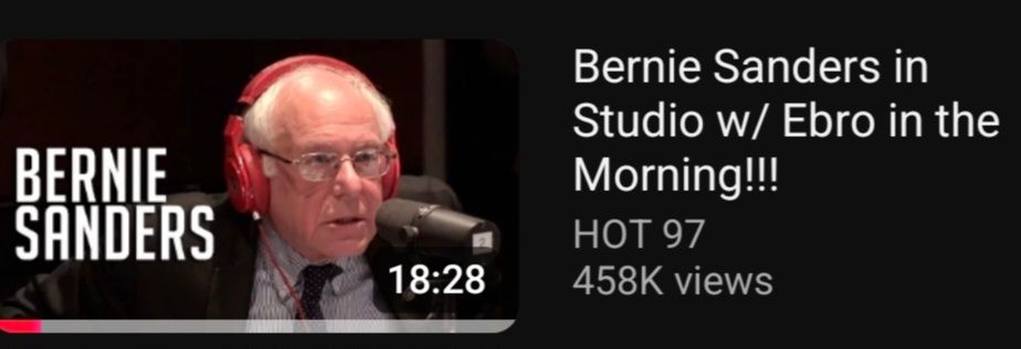 Screenshot of a youtube video with the title "Bernie Sanders in Studio w/ Ebro in the Morning!!!" and the thumbnail is Bernie Sanders in front of a radio microphone with red Beats by Dre ™️ headphones on