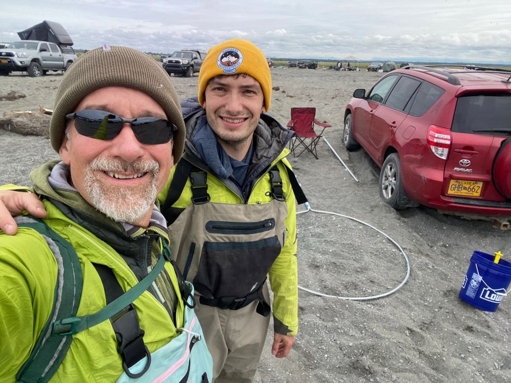 Father and son preparing to dip net