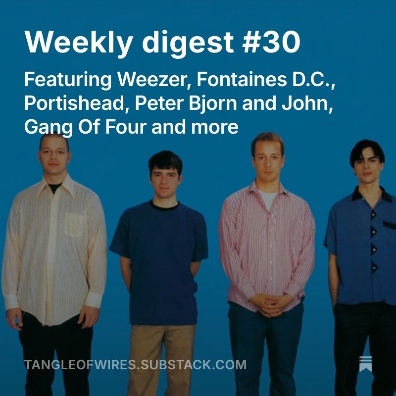 The cover of Weezer’s Blue album showing the four members of the band against a bright blue background
