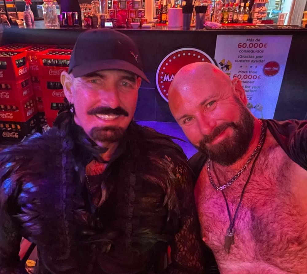 Alex and me in Mardi Gras. Alex is in black. Cap and feathers. I've got my tits out. 