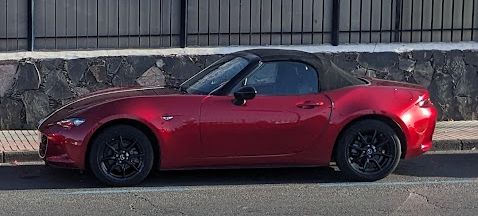 Diego Diablo, a very red Maxda MX5 convertible.