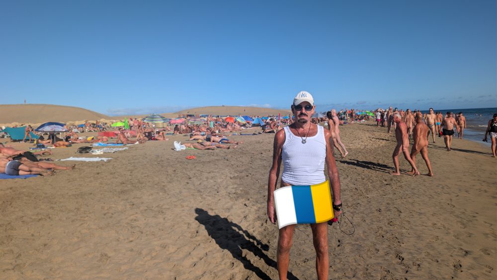 Alex in front of the beach. Once you get past the high tide point, there's barely any space to stand. 
