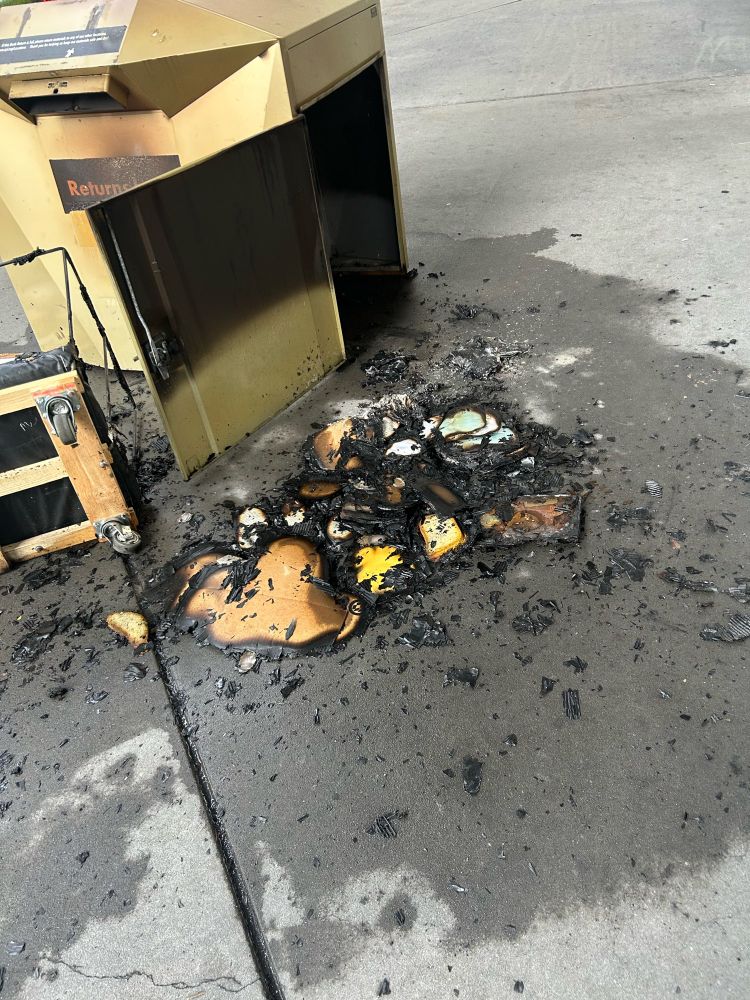 Book drop outside of Central Library with fire damage