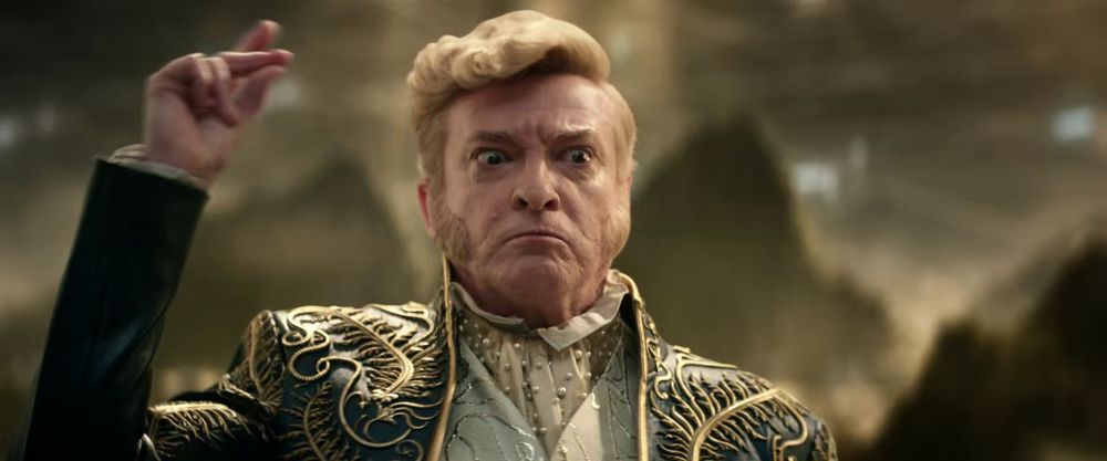 Rhys Darby as Trelane in Star Trek: Strange New Worlds. He's looking angry and is about to snap his fingers.