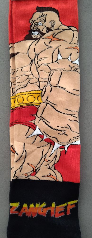 Picture of novelty socks with Zangief from Street Fighter on them.