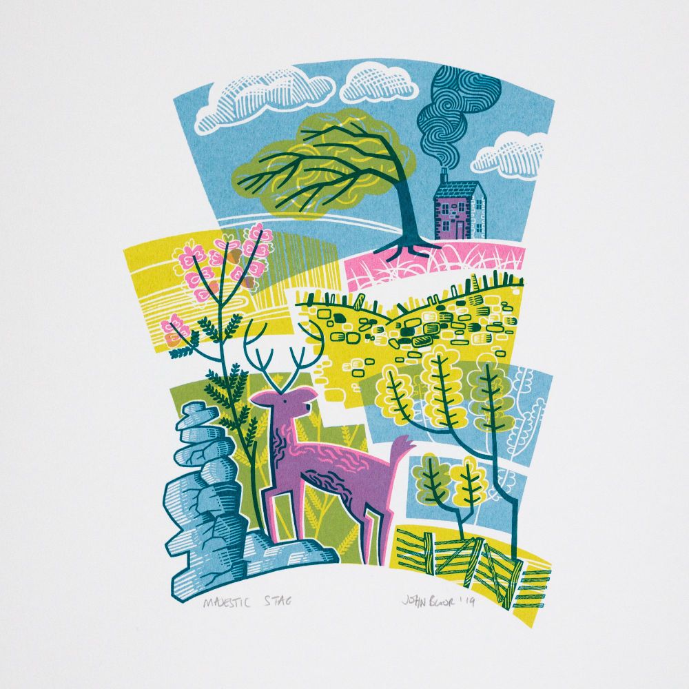 My Majestic Stag print showing a pink stag standing on rocks amongst heather and gorse, a windswept tree, a fence and a stone wall. And a house on a hill.