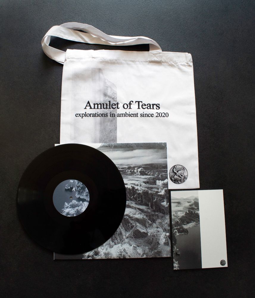 Invisible Cities merchandise, including vinyl, zine and tote bag.