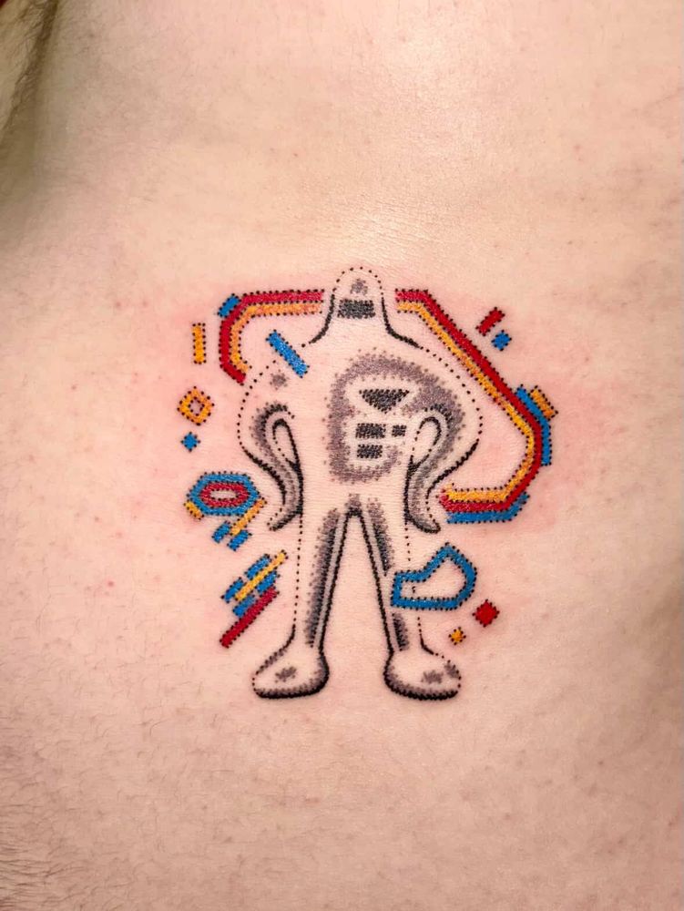 Tattoo of a starman from the video game earthbound