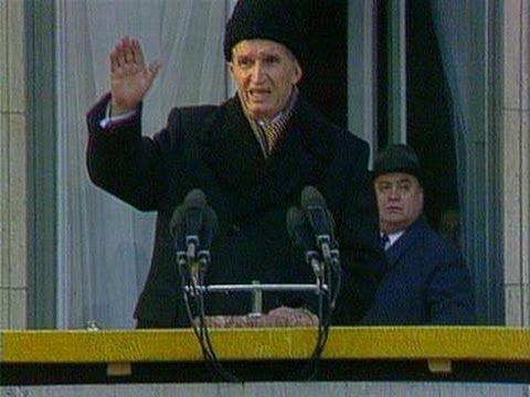 Still frame of Nicolae Ceaușescu giving his final speech on 21 December 1989. The crowd turned angry, and Ceaușescu raises his hand to try to calm them. The crowd soon turned into a riot and extensive protests. Four days later Ceaușescu was convicted by a military tribunal, and executed. 