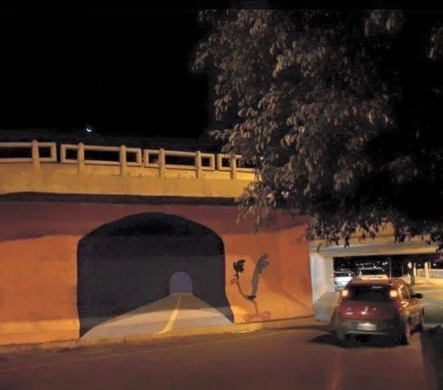 road runner tunnel painting on  bridge wall 