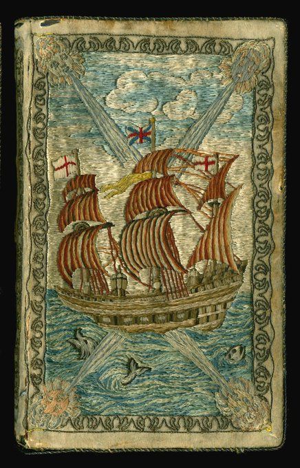 Embroidered book binding of a three-masted ship facing left with four winds blowing gusts from the corners and cavorting whales in the water. From an 1800 edition of Robinson Crusoe embroidered by Charlotte Hawkins. 
Case Y 155 .D3642
https://i-share-nby.primo.exlibrisgroup.com/permalink/01CARLI_NBY/i5mcb2/alma999314368805867