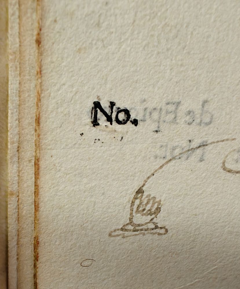 Letterpress marginal "No." with a hand drawn manicure below.