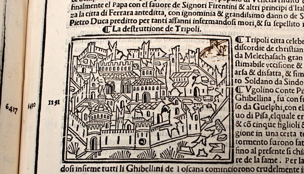 Tripoli under attack with more buildings on right in browned ink.