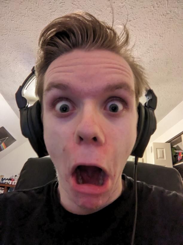 it's me with headphones on (my hair is a little messed up cuz i wore a hat for a few hours). i am in shock and awe and excited