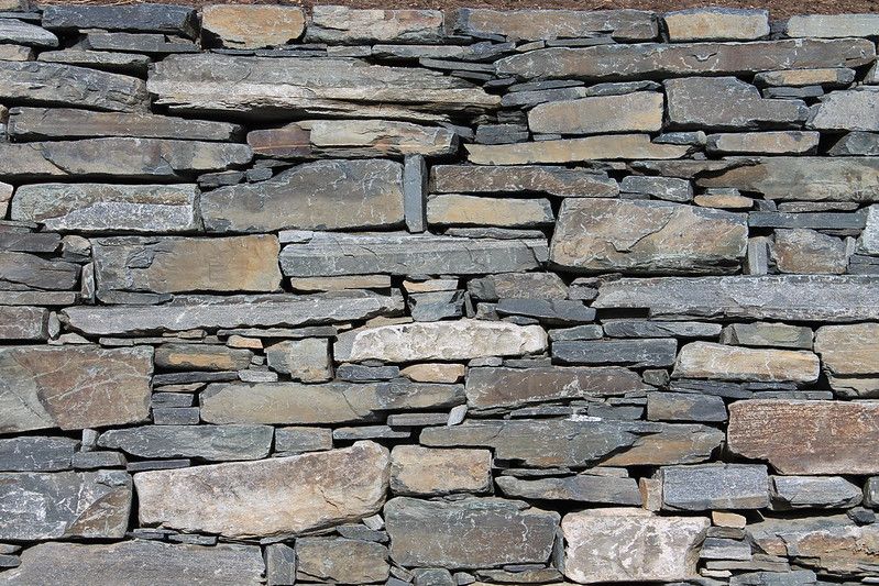 A photo of a dry stacked stone wall.