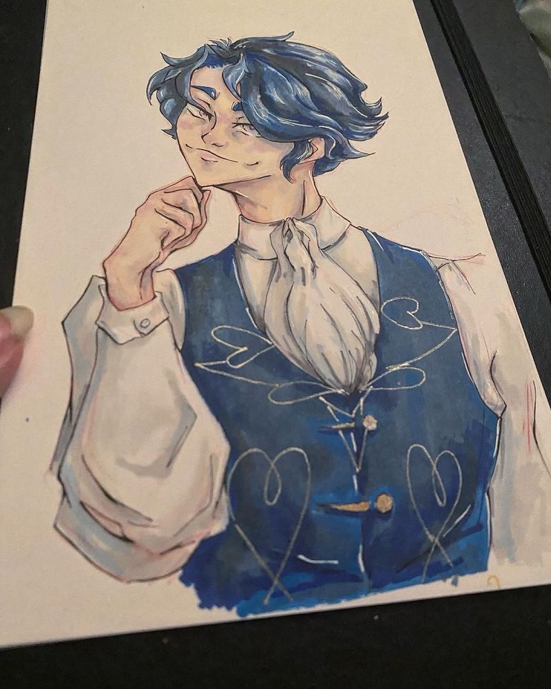 Traditional art piece tilted in the light to se the shimmering gold paint on the clothes