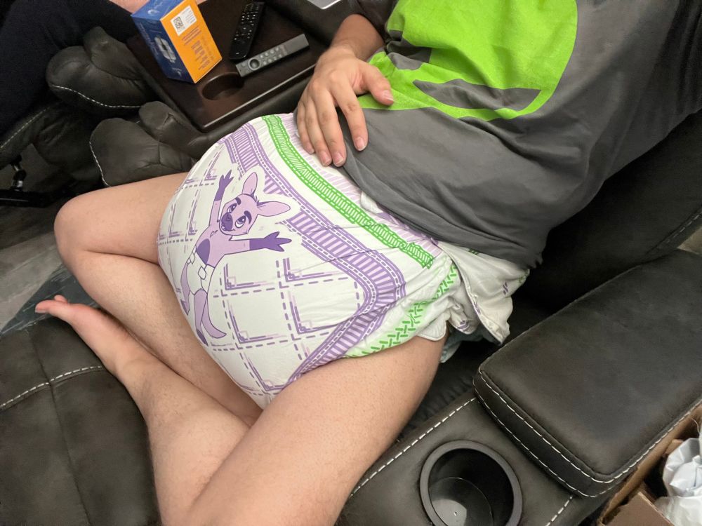 Selfie of myself wearing an oversized cloth diaper cover