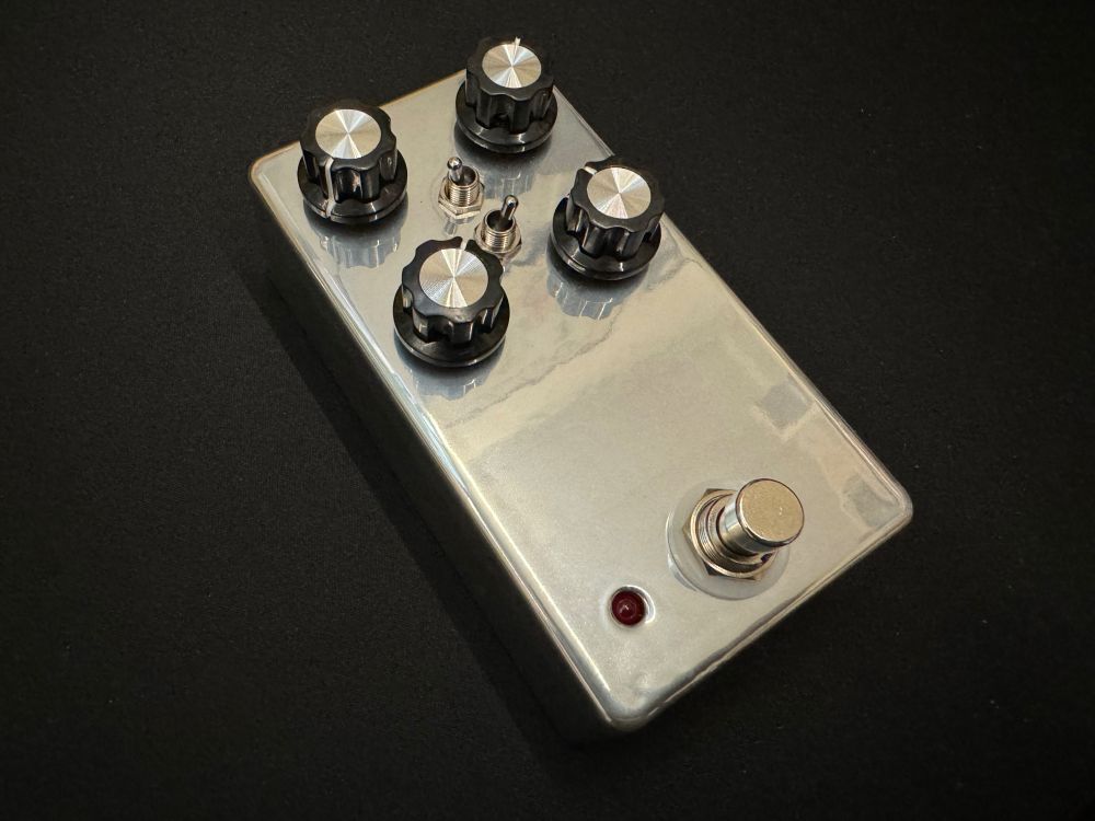 Completed pedal in a very neat chromish finish.