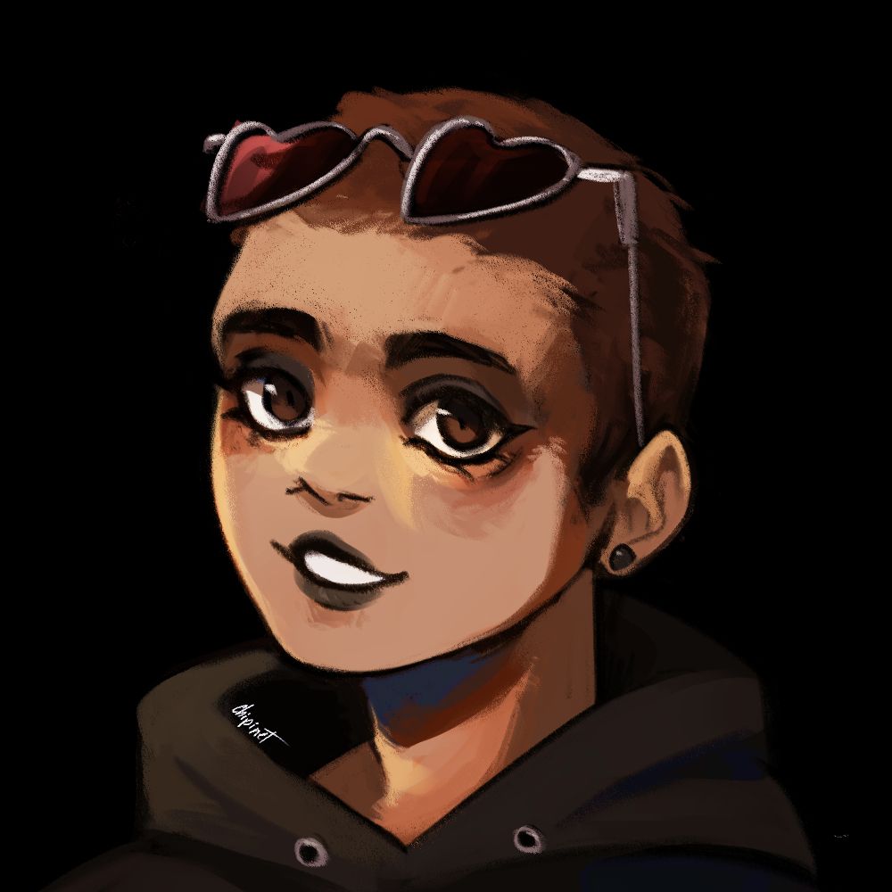 Portrait of a woman with tan skin and a buzzcut, wearing black eye and lip makeup, a black hoodie and heart-shaped sunglasses