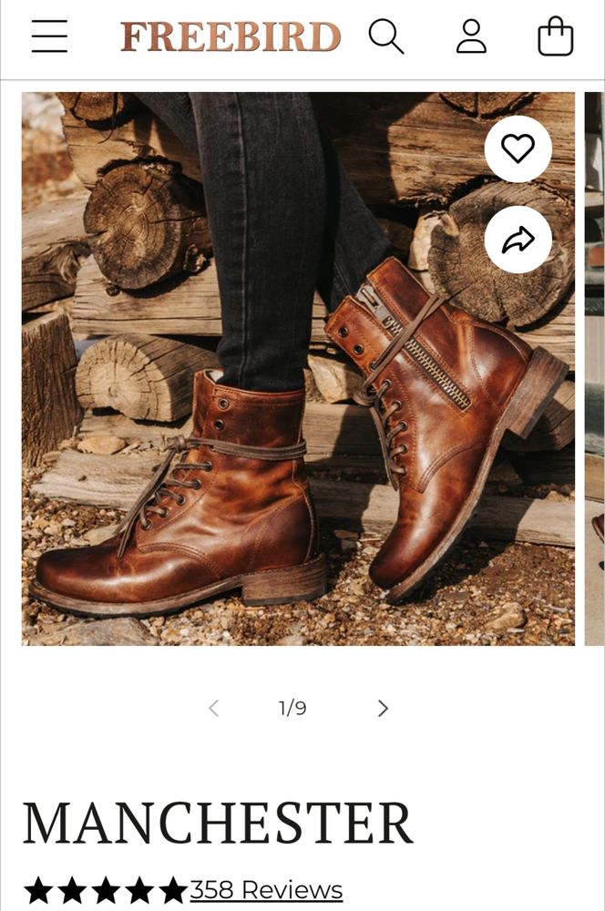 A pair of lace up Manchester boots from Freebird. They're a rich cognac brown with a rounded toe, low heel and extra leather string around the top. 