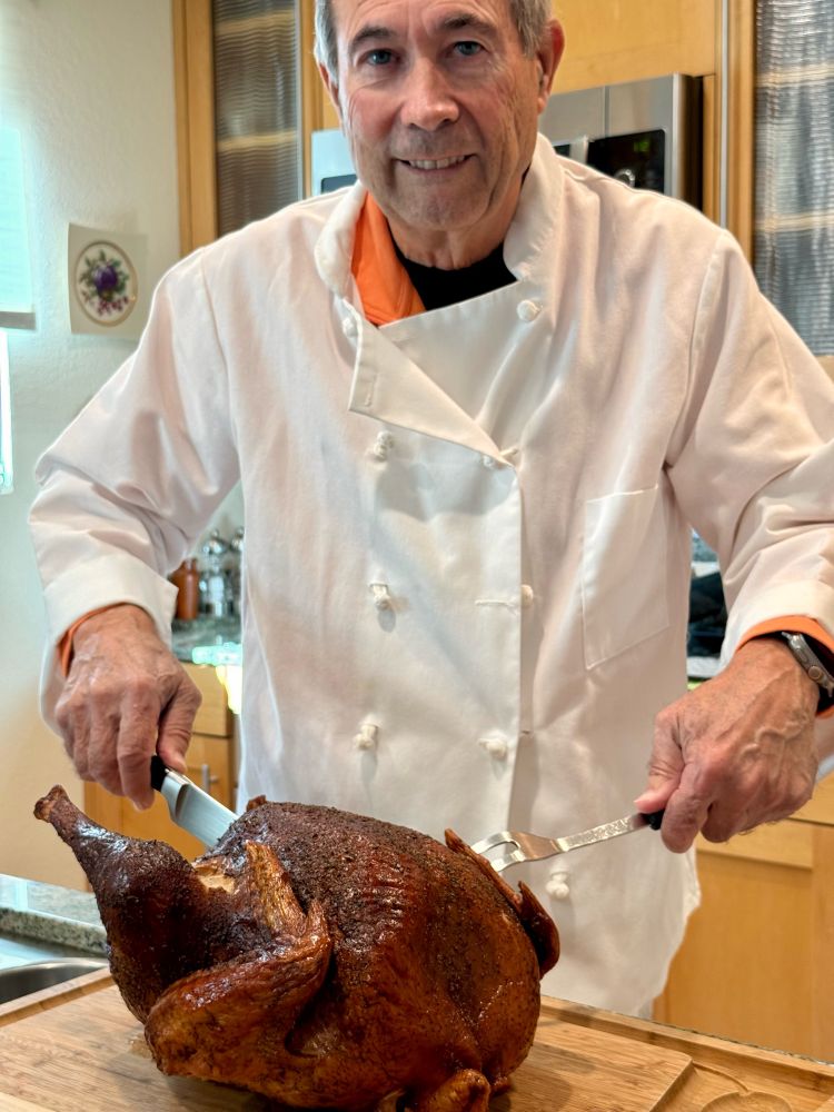 My husband, Peter, carving the turkey