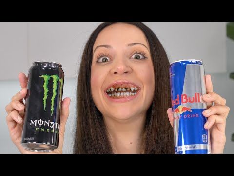 Woman with bad teeth holding Monster and Red Bull cans
