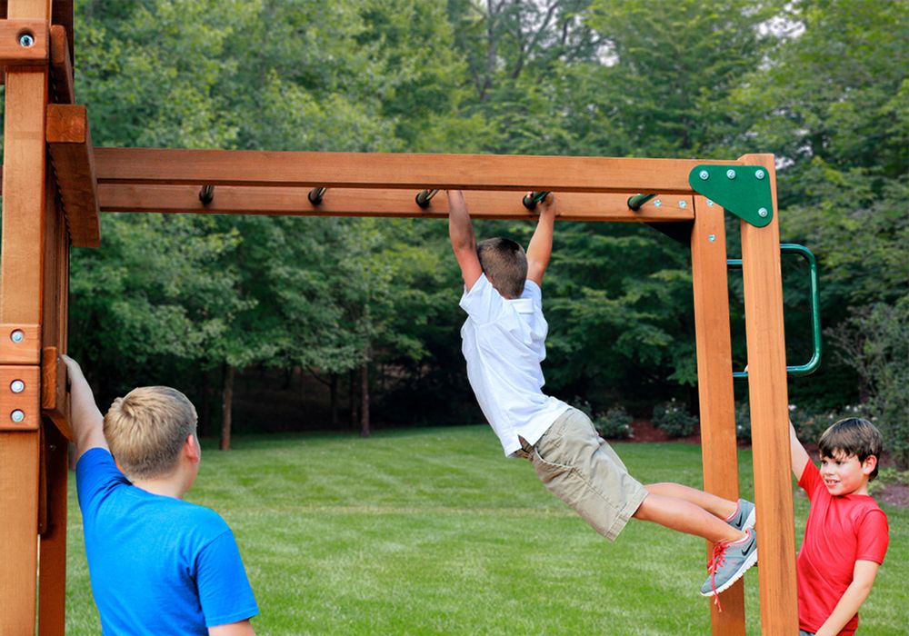 Boy on monkey bars 