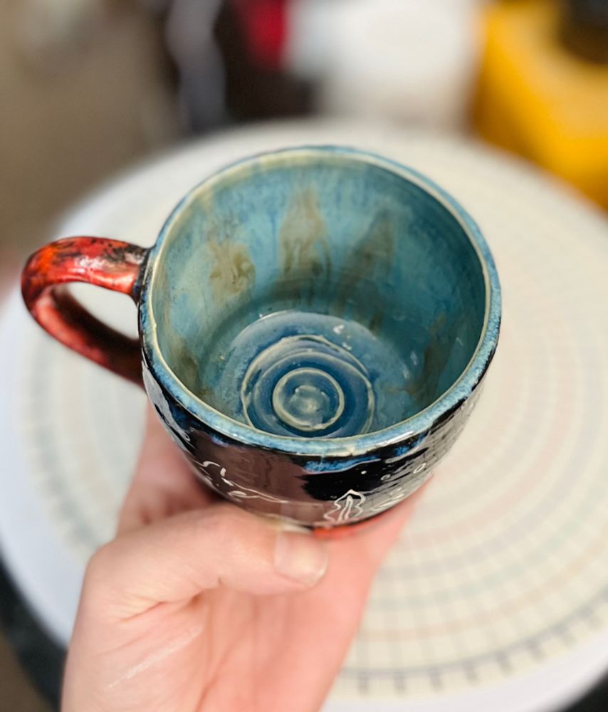 A mug with blue grey glaze inside