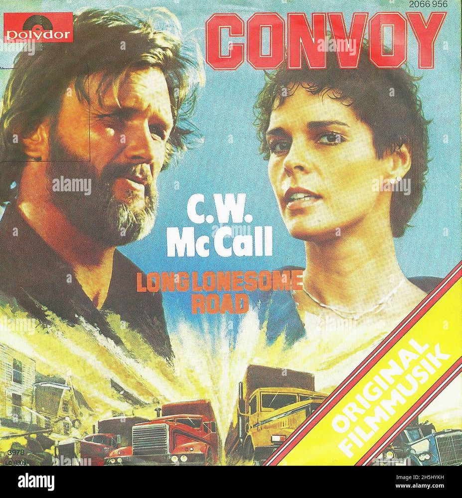 Photo of the cover of the single with the C.W. McCall song Convoy.  Shows 3 or 4 semi-truck cabs arrayed on the bottom haloed by yellow-white streaks, plus images of Kris Kristofferson & (must be) Ali McGraw (looks rather like Jamie Lee Curtis tho)