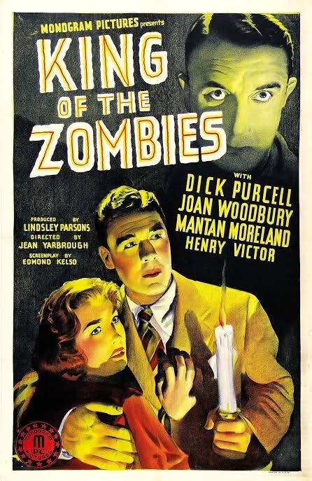 The poster for the movie. A man is holding a woman close and lighting their way with a candle.
