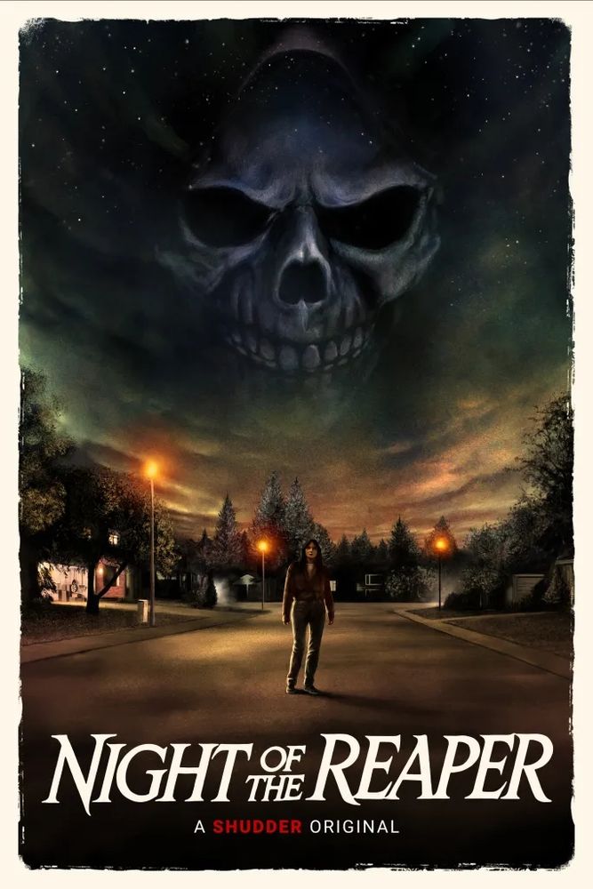 The movie poster, showing a woman in a suburban street with a skull looking down at her from the sky.